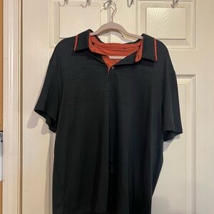 Champs Black Polo with Orange Accents